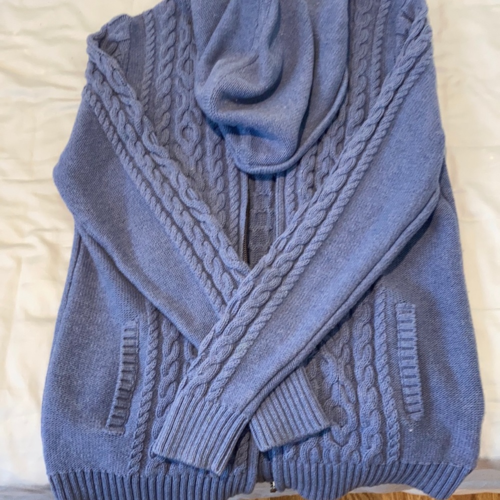 Rarely worn perfect condition zip up sweater.